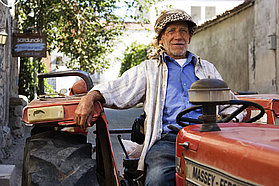 Local farmer on his vehicle